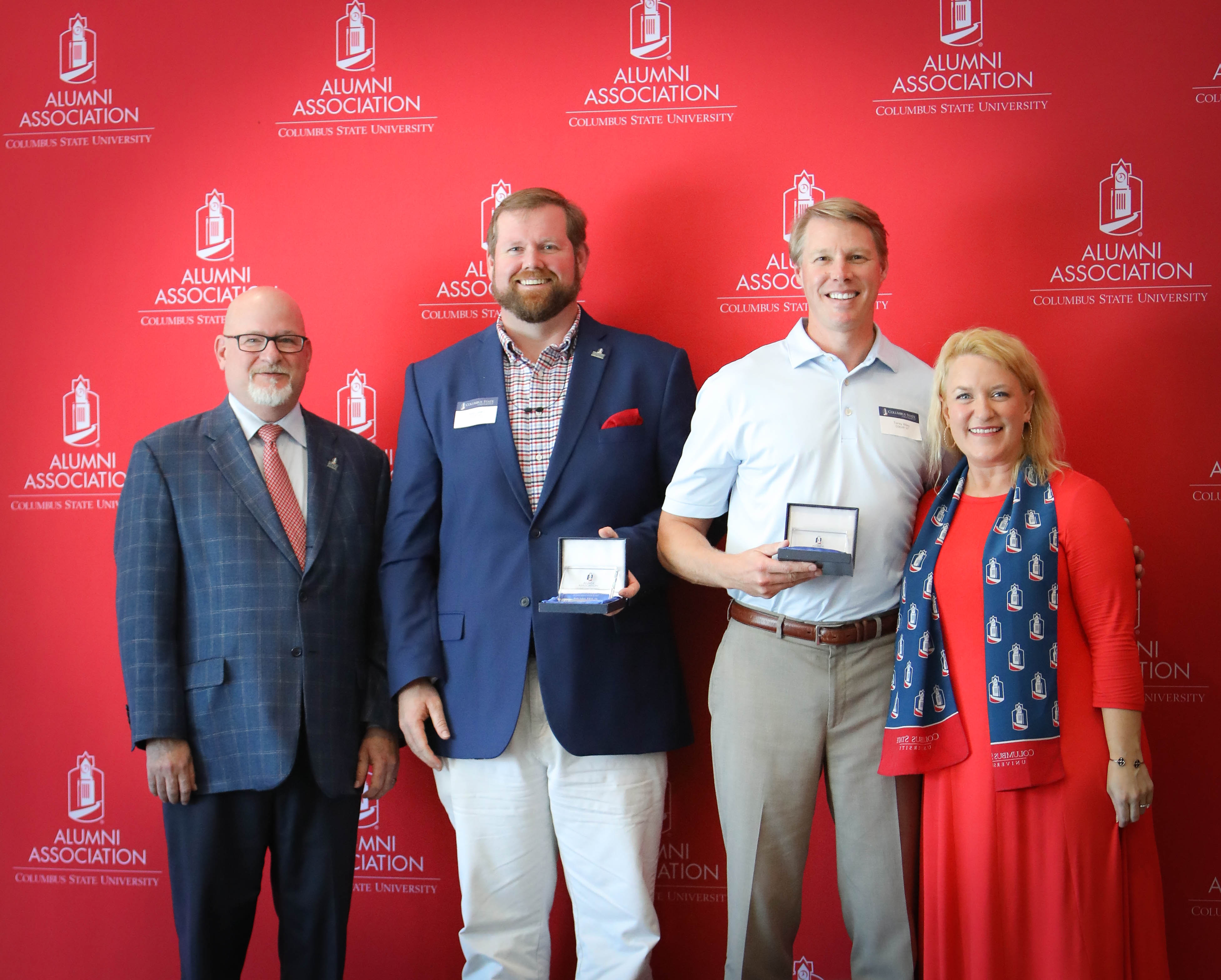 (left to right) Retired Columbus State President Dr. Chris Markwood, Andy Luker ’12, Torrey Wiley ’97, and then-CSU Alumni Association President Cortney Wilson ’11,’12 at the 2021 Alumni Recognition Awards Luncheon.
