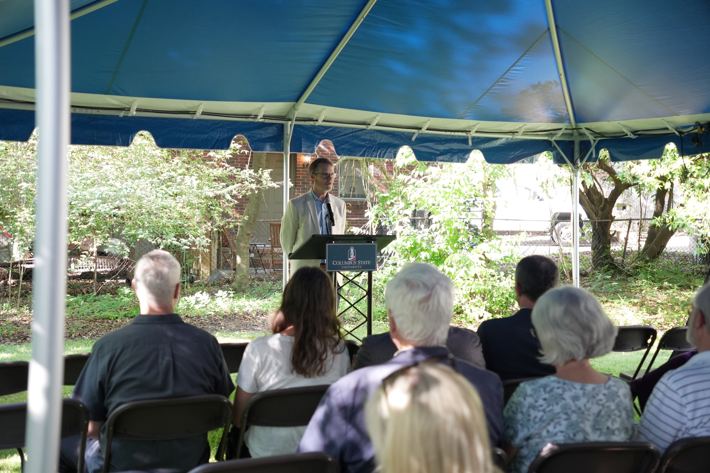Dr. Nick Norwood makes remarks at an April 20 event celebrating support of the McCullers Center