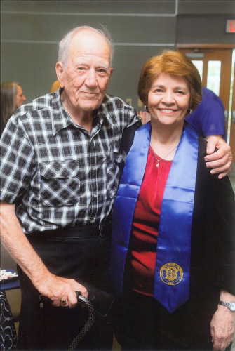 Ellen Roberts with her father George at her retirement celebration