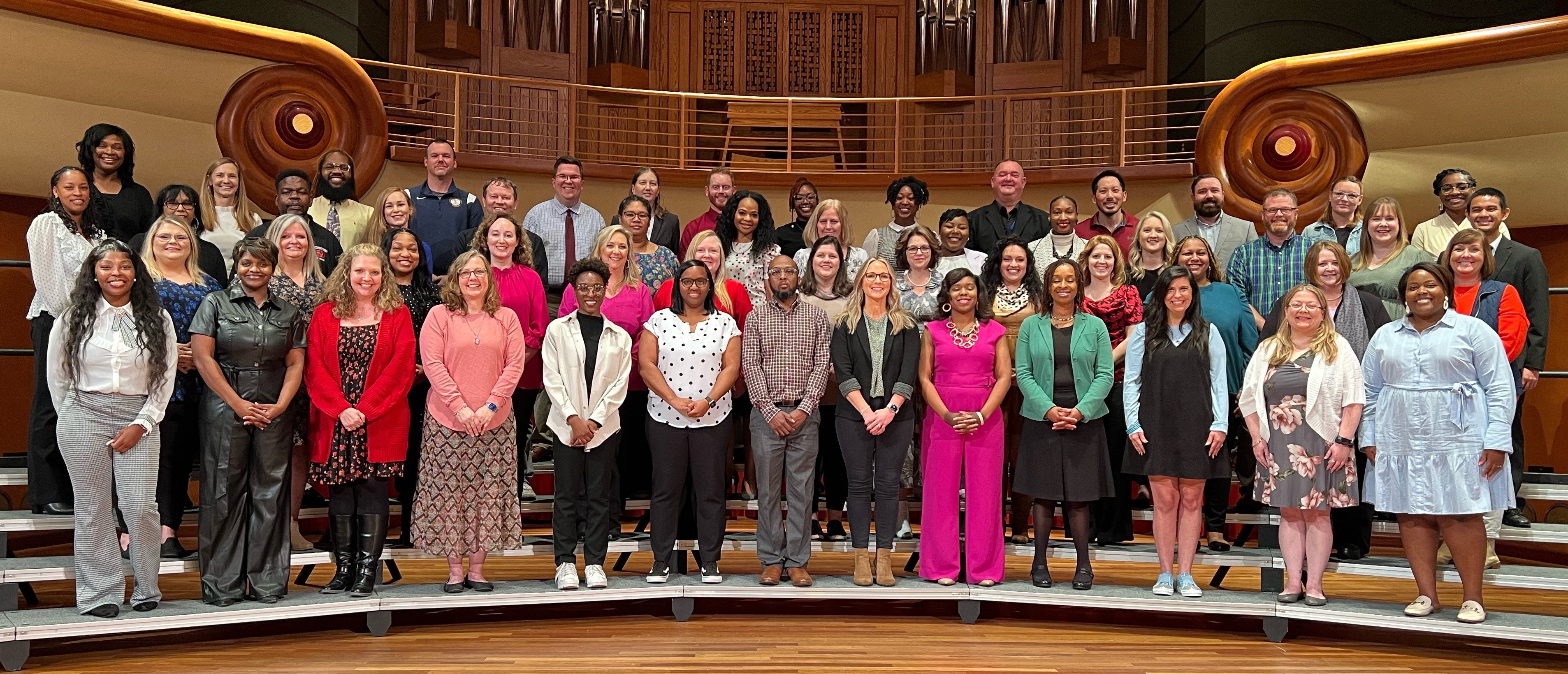 Group photo of the Muscogee County School District's school-level teachers of the year standing on risers in Legacy Hall