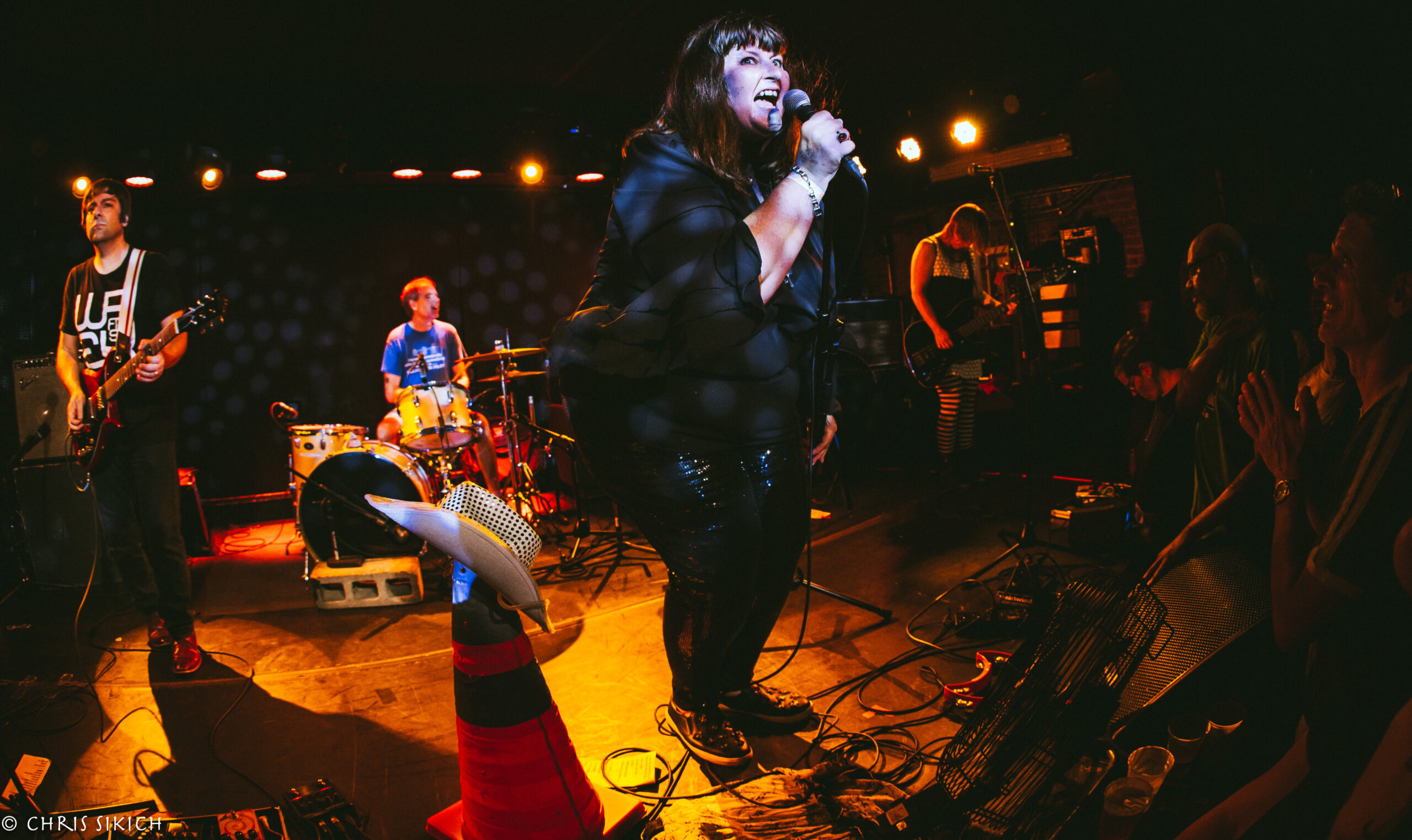 Pylon Reenactment Society performing on stage