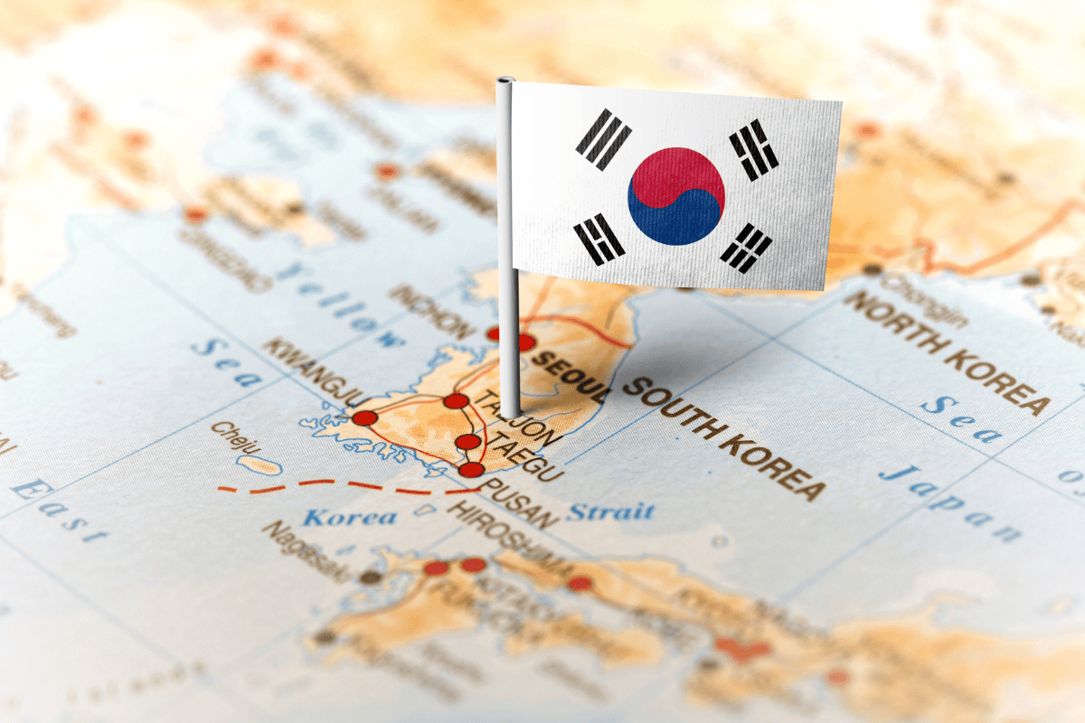 World map with a South Korean flag inserted in the Korean peninsula. 