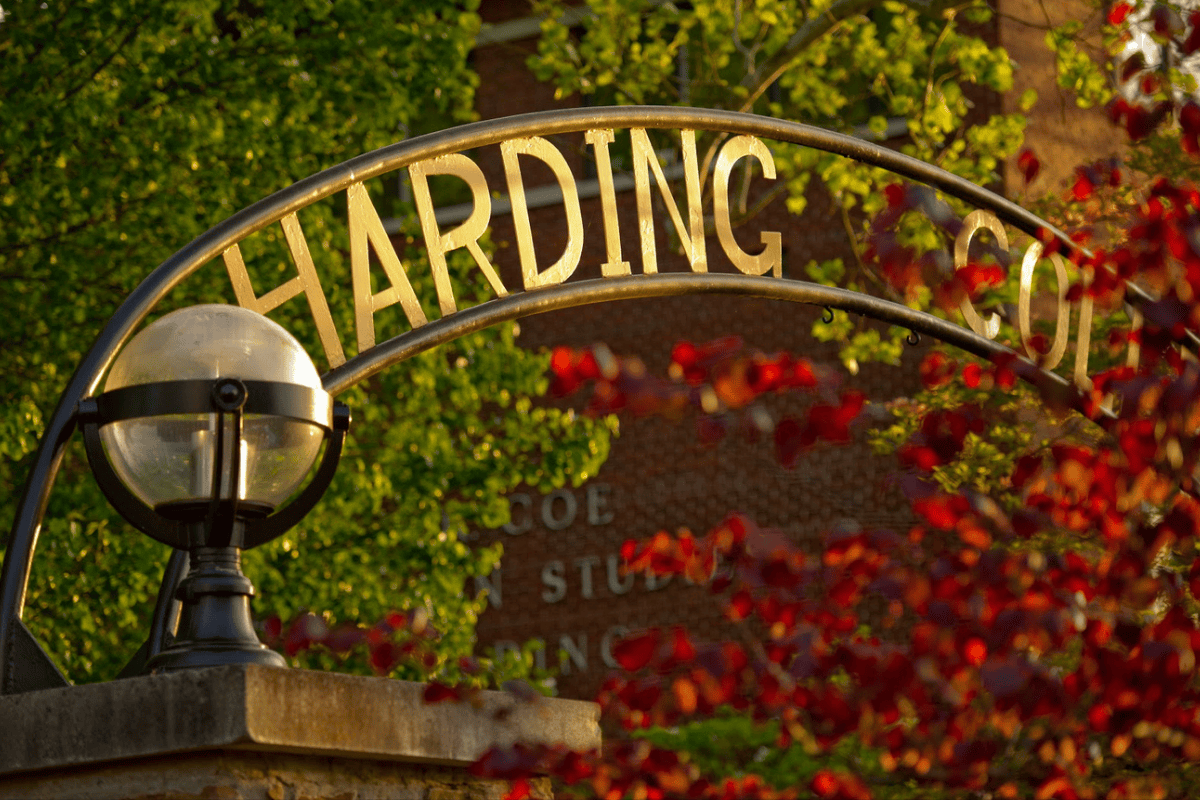 Close-up of a archway with the words "Harding College" on it.