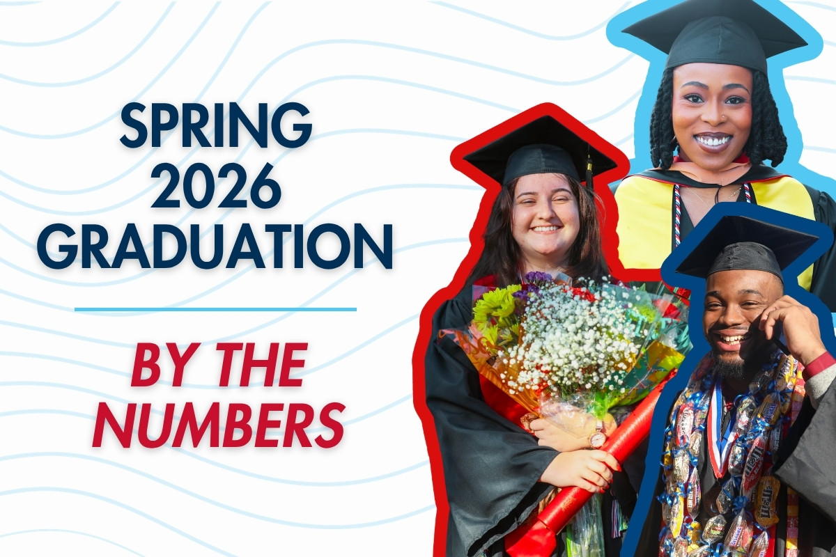 A promotional graphic with the text 'Spring 2026 Graduation By The Numbers' set against a white background with subtle blue wavy lines. The right side features a collage of three smiling graduates in caps and gowns: a woman holding a large bouquet of flowers, a woman in a yellow academic hood, and a man wearing a candy lei.