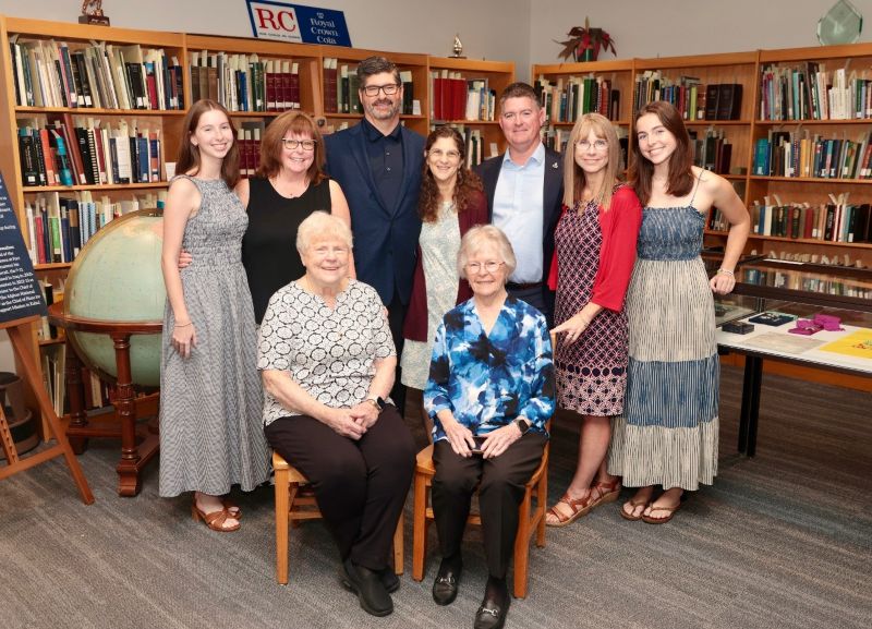 Group photo of the Donahoe and Foster families