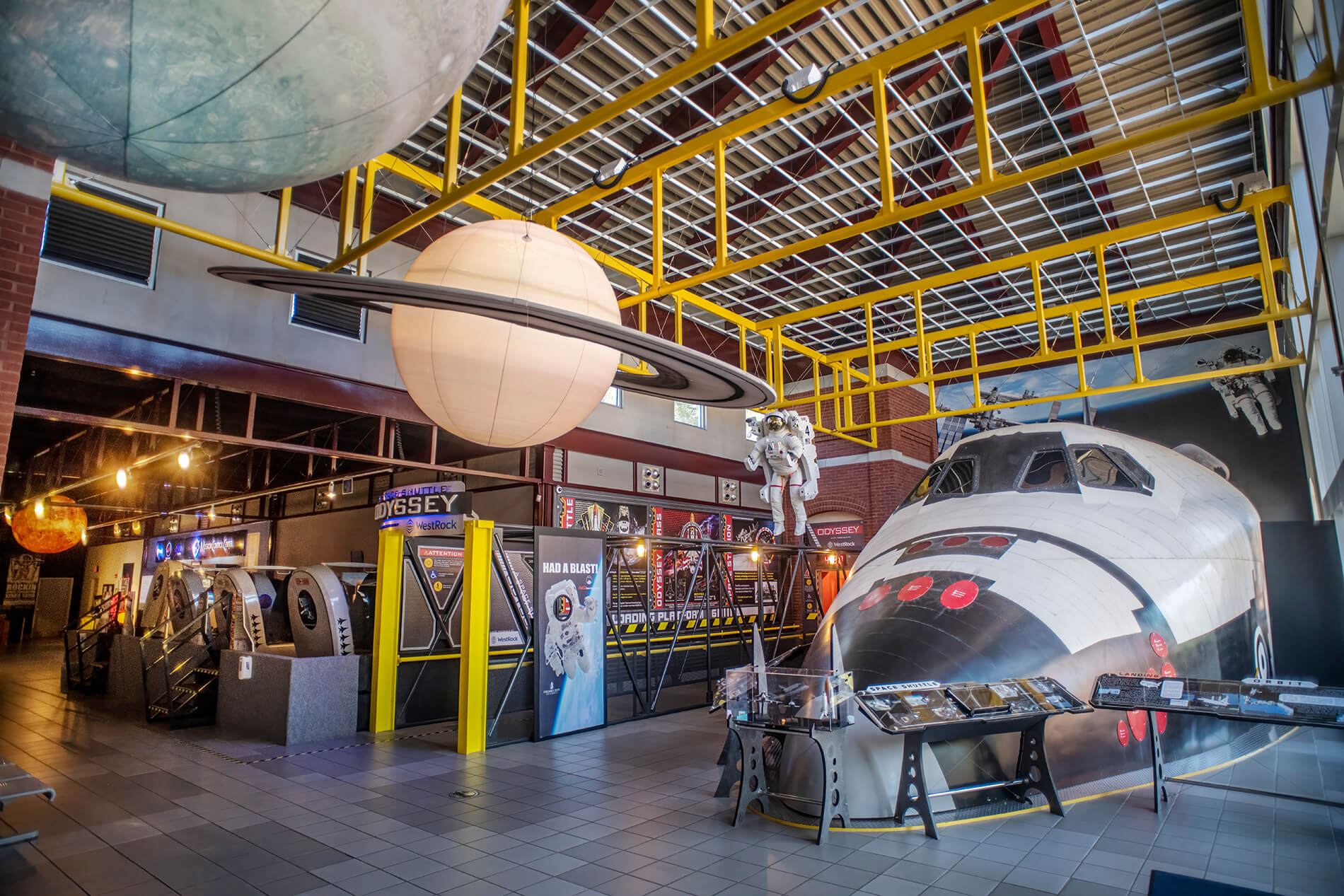 Internal photo of the Coca-Cola Space Science Center's Space Shuttle exhibit and simulators