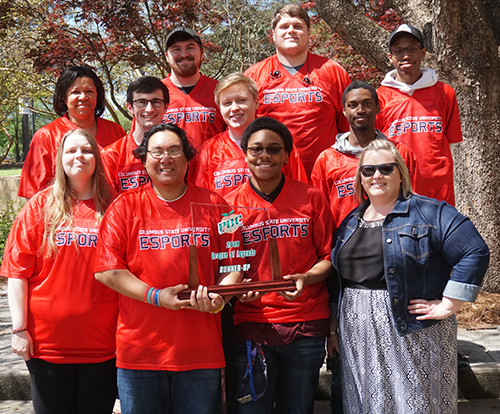 Collins (middle row, far left) with his League of Legends team