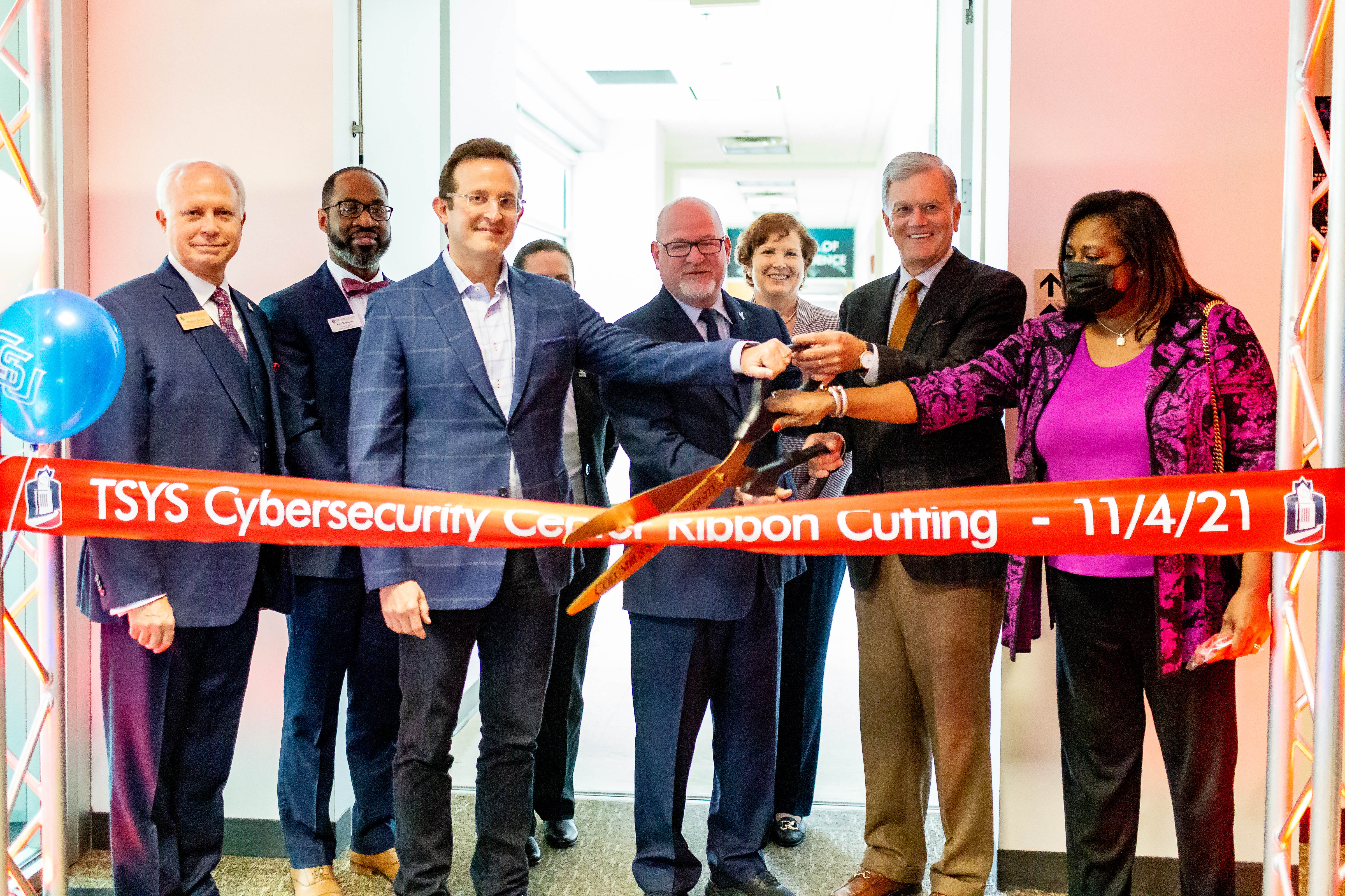 CSU administrators and Global Payments CEO Jeff Sloan cut the ribbon on the TSYS Cybersecurity Center